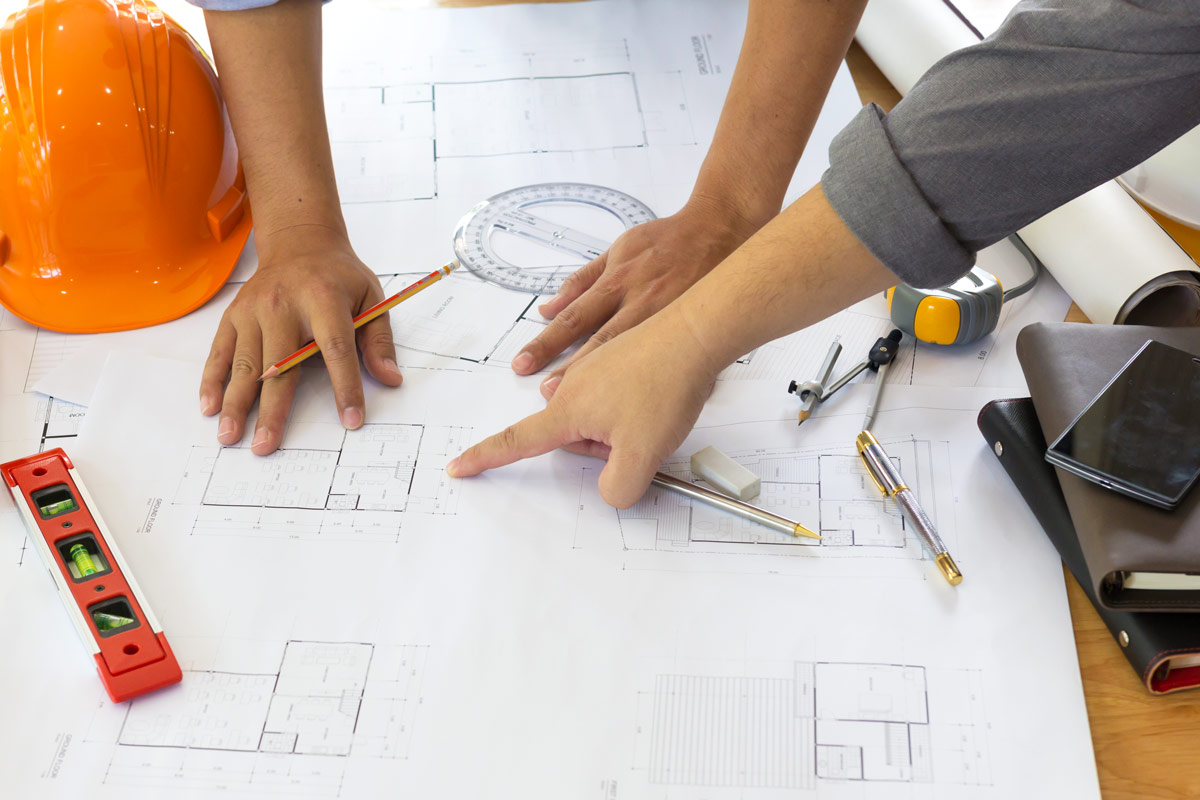 New Home Builder Reviewing a Design Build for a New Residence in Austin, TX